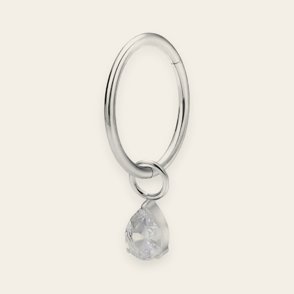 Silver titanium cartilage hoop with pear cubic-zirconia charm — plain hinged clicker ring, nickel-free, Aurea