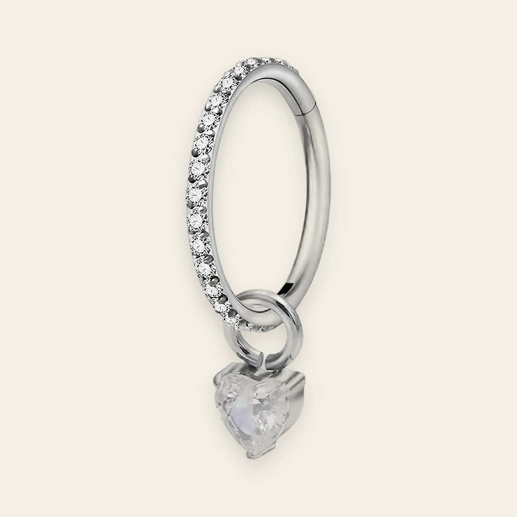 Silver titanium cartilage hoop with heart cubic-zirconia charm — crystal-pavé hinged clicker ring, nickel-free, Aurea